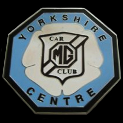 MG