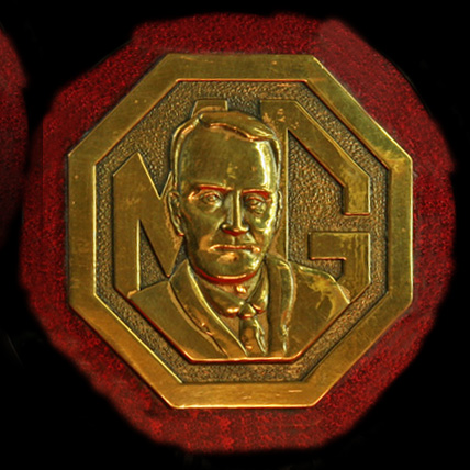 MG