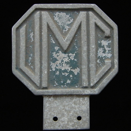 U.M.C. car badge