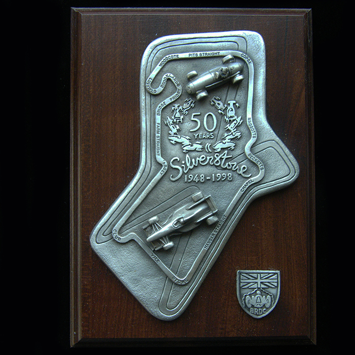 Silverstone 50 Years boxed badge on wood