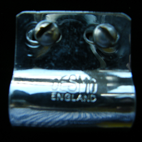 Badge bar fittings