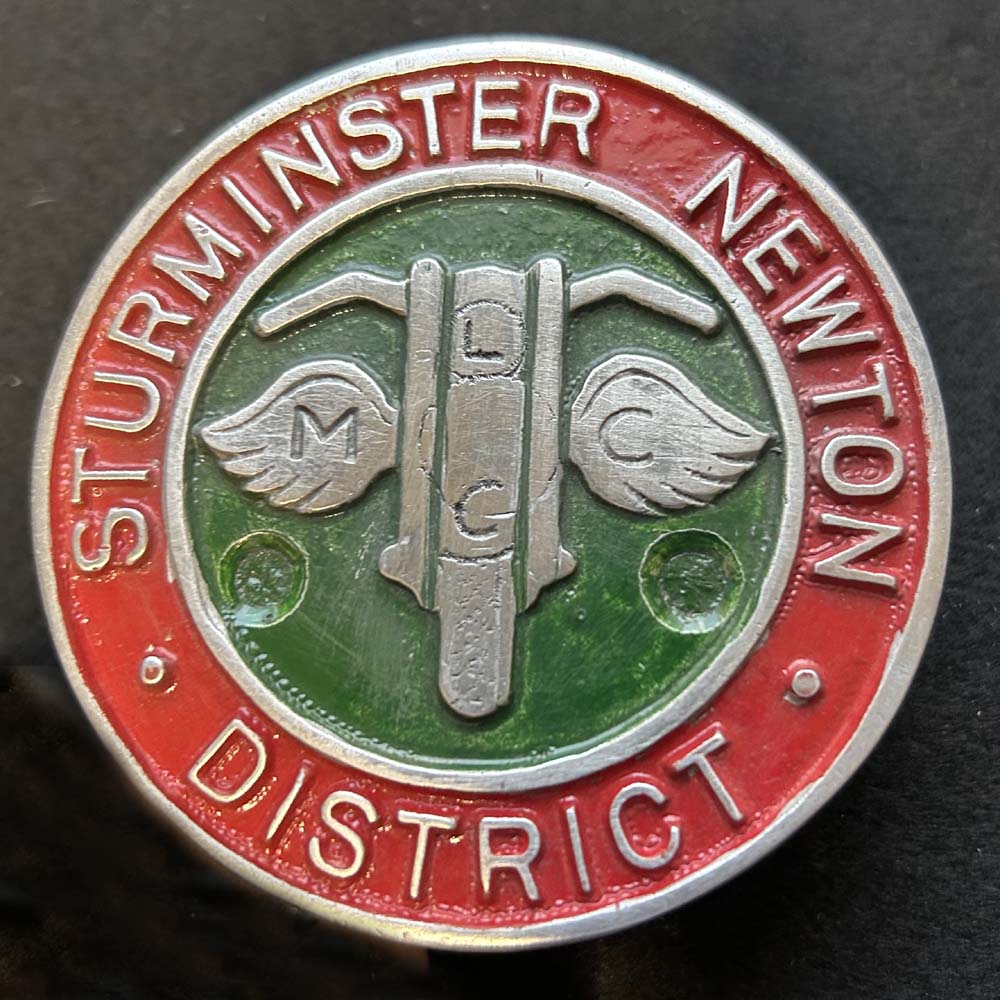 Sturminster Newton & D M C & L C C car badge