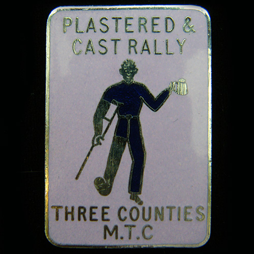 Plastered & Cast Rally pin badge