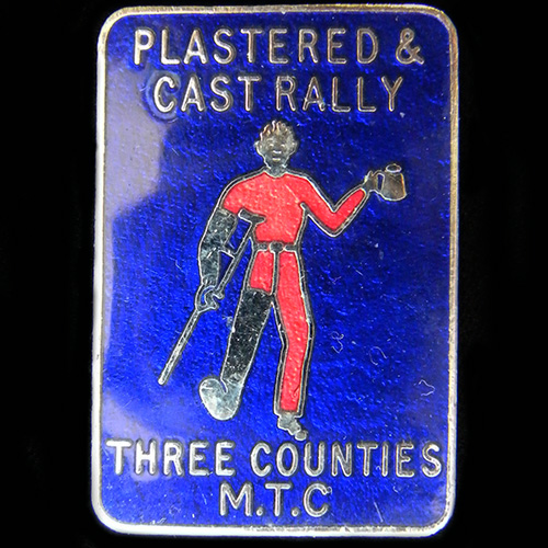 Plastered & Cast Rally pin badge