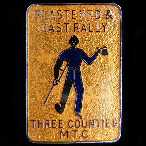Plastered & Cast Rally pin badge