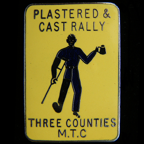 Plastered & Cast Rally pin badge