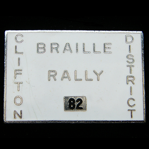 Braille Rally pin badge
