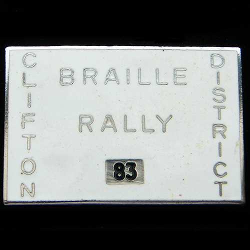 Braille Rally pin badge