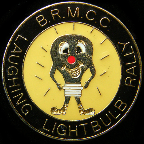 Laughing Light Bulb Rally pin badge
