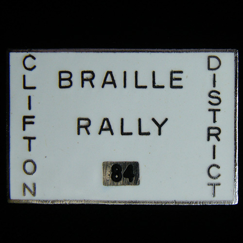 Braille Rally pin badge