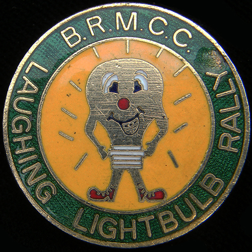 Laughing Light Bulb Rally pin badge