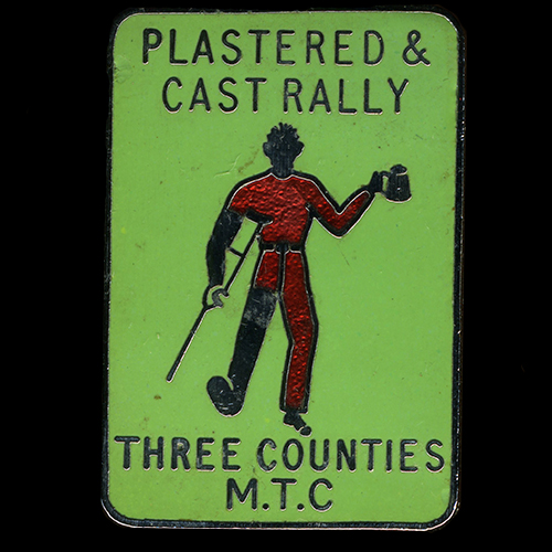 Plastered & Cast Rally pin badge