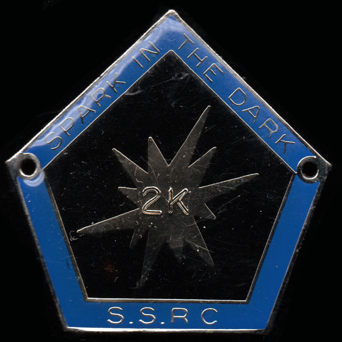 Spark in the Dark Rally Lapel badge