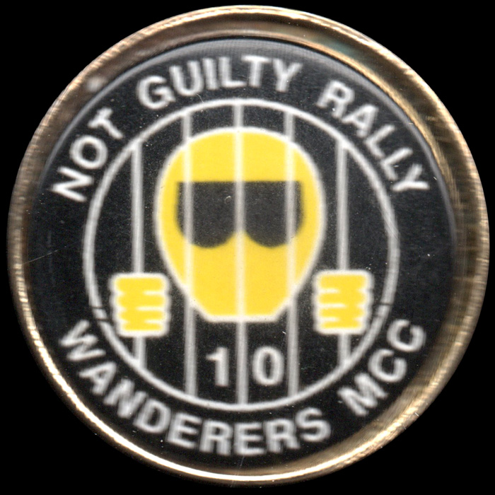 Not Guilty Rally pin badge