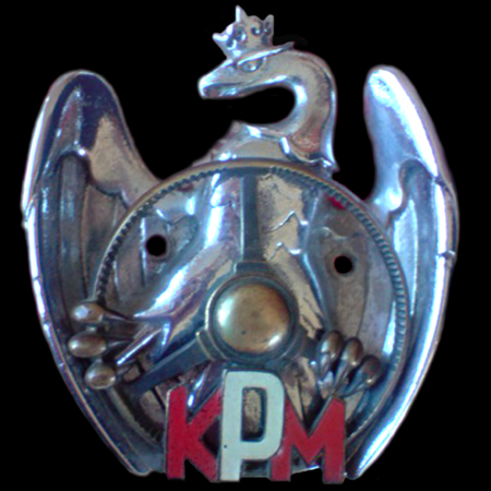 K P M